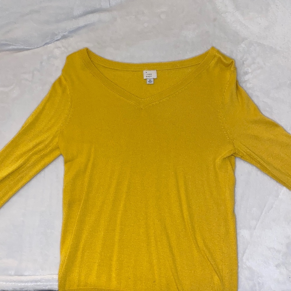Long sleeved, fit, and yellow long sleeve from “a new day”